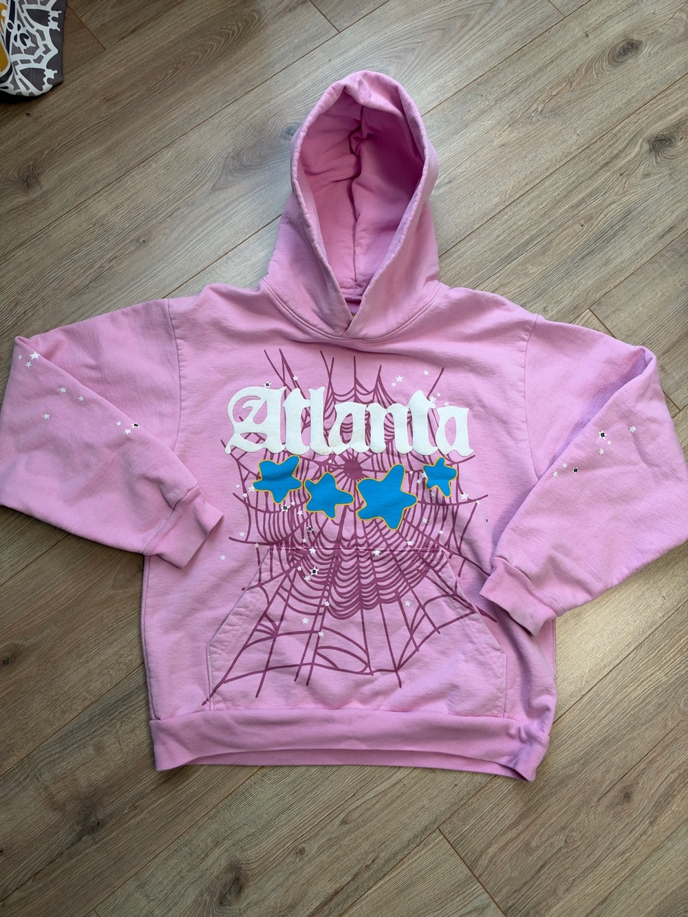 Pink Sp5der 'Atlanta' Graphic Pullover Hoodie with Blue Star Accents- used